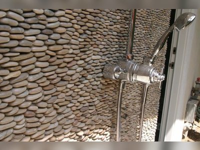 Standing Pebble Tiles Add Texture to Your Shower Walls