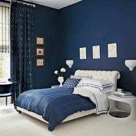 An inky modern bedroom with a classic twist
