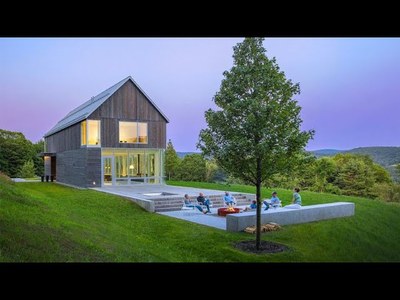 Modern Barn House Built Into a Hillside Meadow