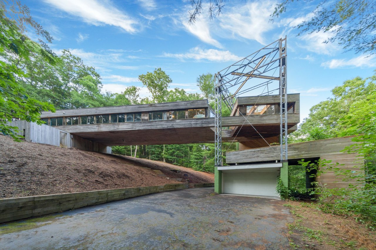 A Bridge-Like Home Suspended Above a Connecticut Hillside