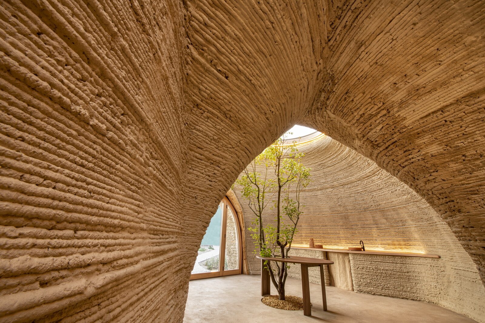 TECLA 3D-Printed Home by Mario Cucinella Architects and WASP