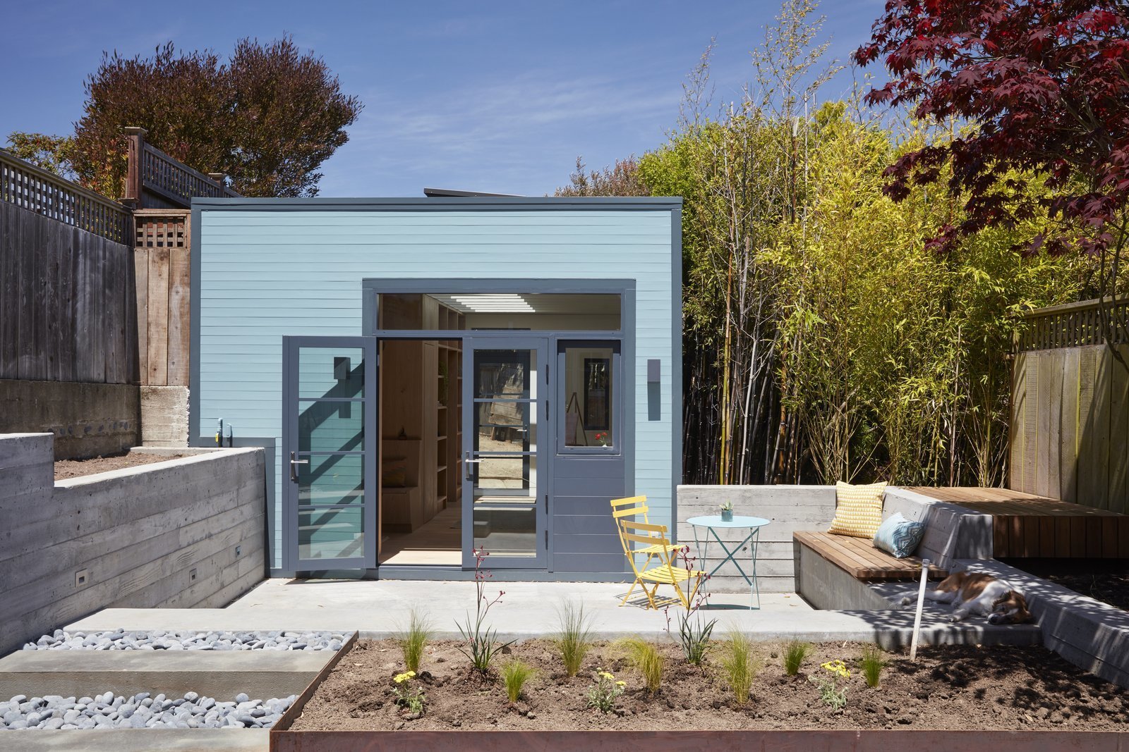 An Unused Garage Is Transformed Into a Light-Filled Backyard Studio
