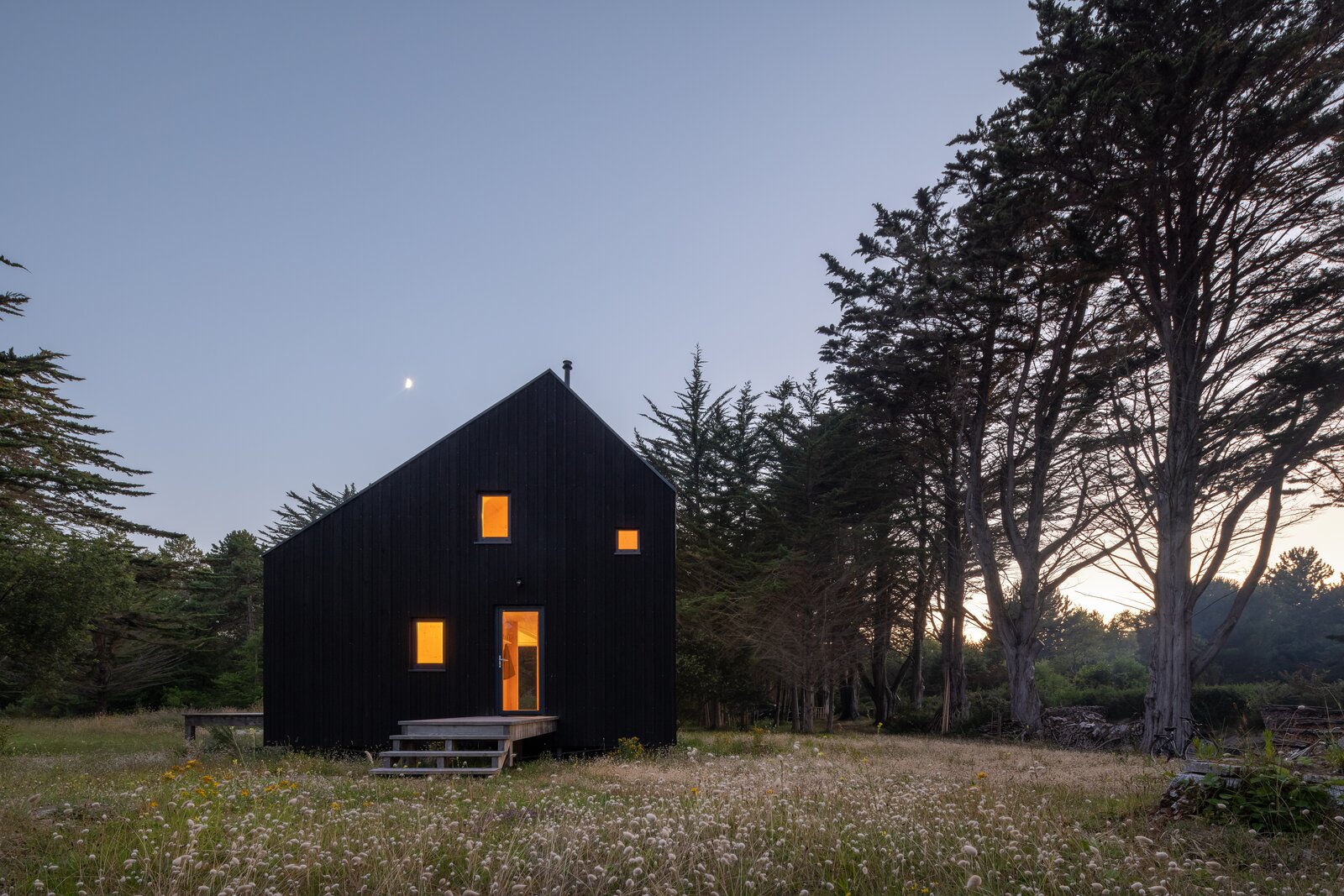 An Angular Black Cabin in Coastal France Honors the Bucolic Landscape
