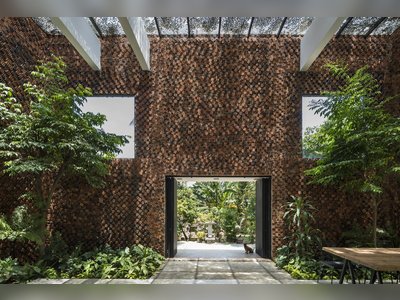 A Biophilic Home in Vietnam Impresses With a Hollow-Brick “Breathing Wall”