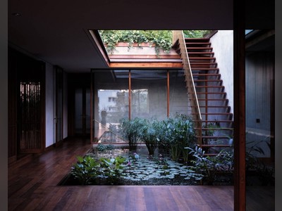 Serene House with Courtyard Pond